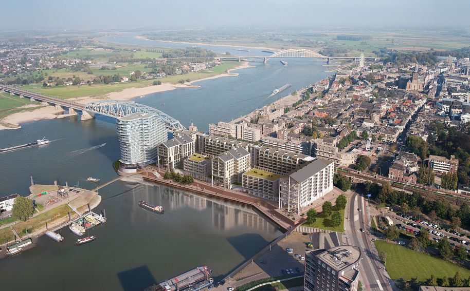 Luchtfoto van de Handelskade aan de Waal in Nijmegen, met de bruggen op de achtergrond
